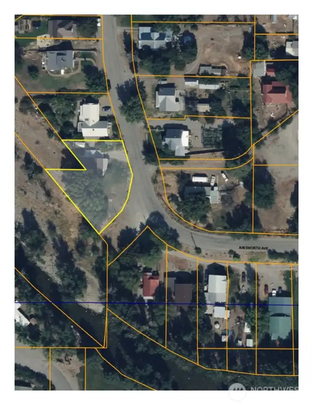 At the southwest end, this property extends to city land that touches the banks of the Twisp River. This is a county aerial.