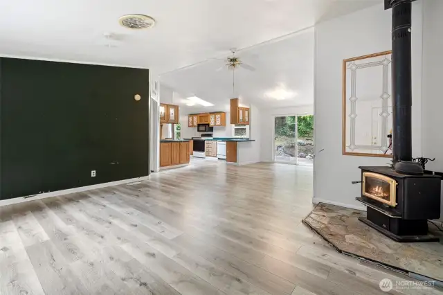 Enter the home to the spacious living room with cozy fireplace
