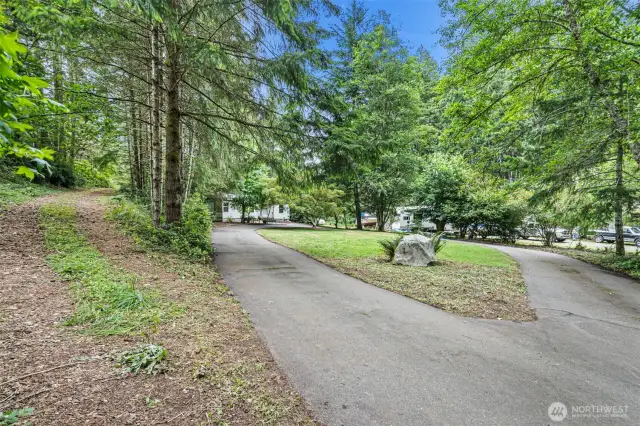 Paved circular drive to home entry