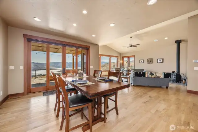 Dining area with large sliding French doors that lead to the patio.