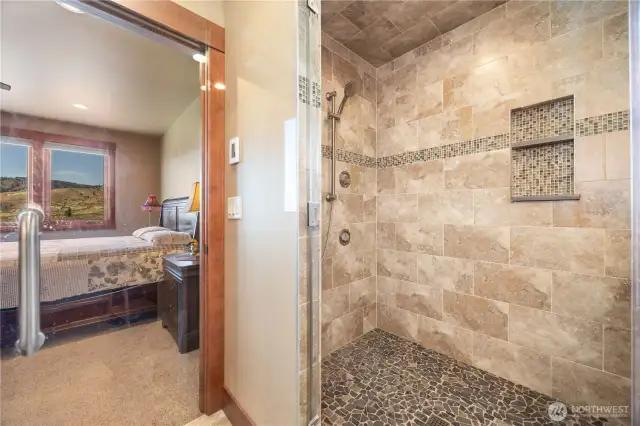 The Walk in shower in the Main Suite has a built in steamer feature.