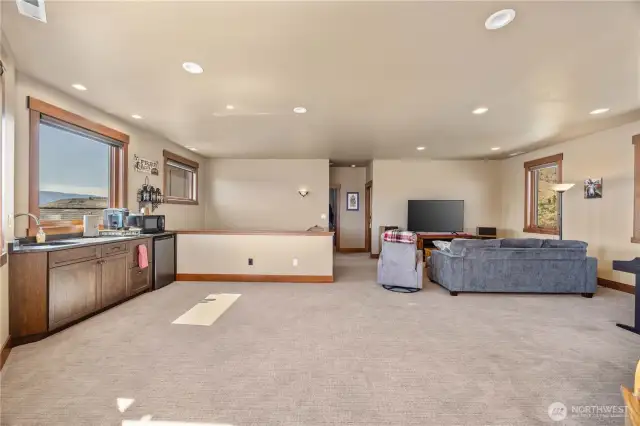 Bonus room is equipped with a wet bar, small fridge and microwave.