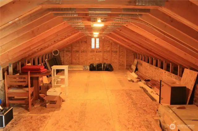 From the Bonus room, there is an attic storage space, the footprint of the garage.