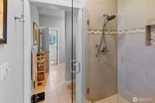 Tiled shower and radiant floor.