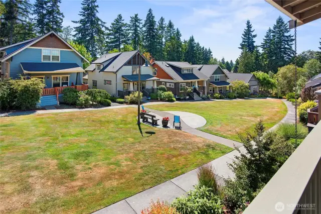 A view across the courtyard to other similar craftsman homes.