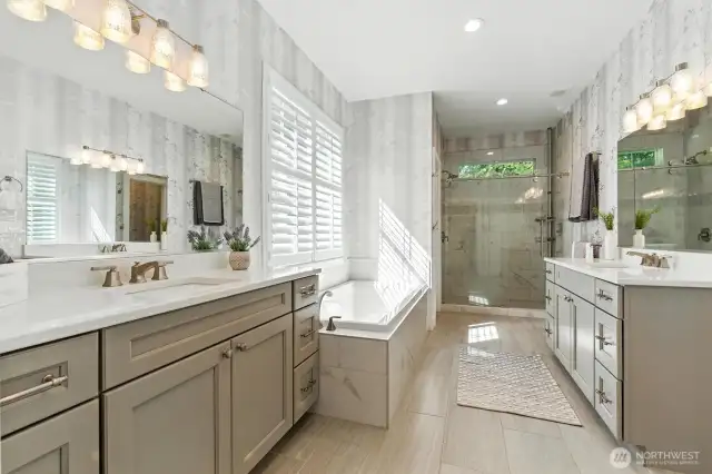 Spacious 5-piece primary bath with double vanity and under-mount sinks will not disappoint!
