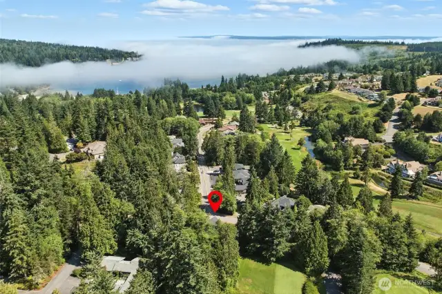 Submerged just off the golf course, you'll love the proximity to trails, water and be embraced by this warm community!