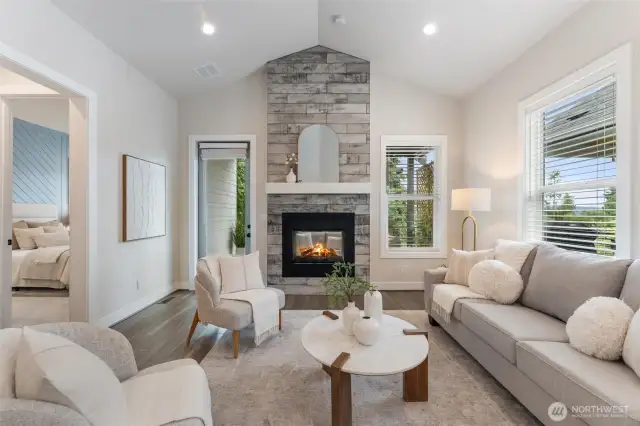 Indoor/outdoor fireplace just off living room