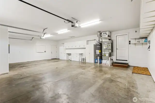 3 car garage/shop with separate exterior man door