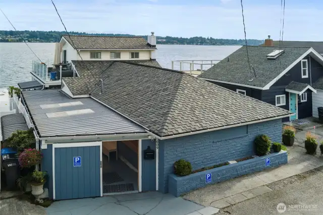 Front of home. Garage door has been removed.