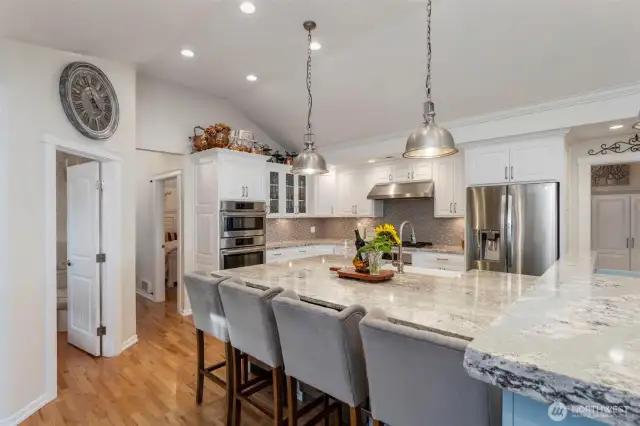 Kitchen in cooks delight and great for family and friends to get together. Gas range and two dual zone wine fridges.