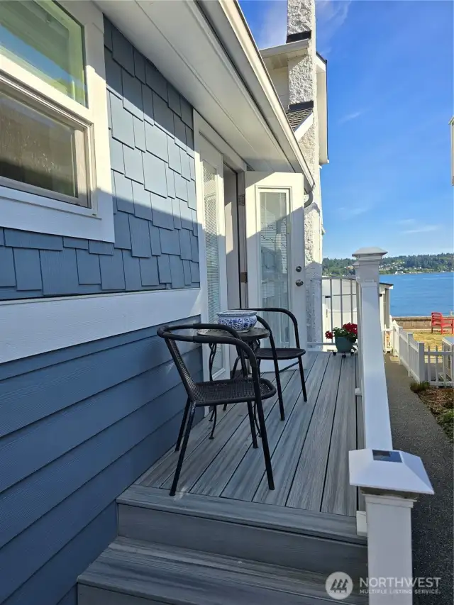 West side of home deck and entrance to side of home