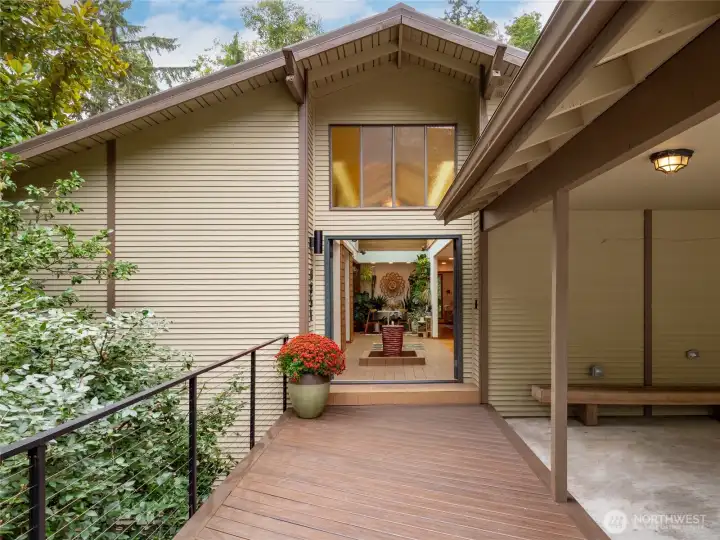 Set on a shy half-acre lot surrounded by trees, let this home transport far away from the hustle and bustle of busy life.
