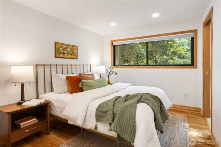 One of two bedrooms on the lower level, nice and spacious with its own ensuite bathroom!