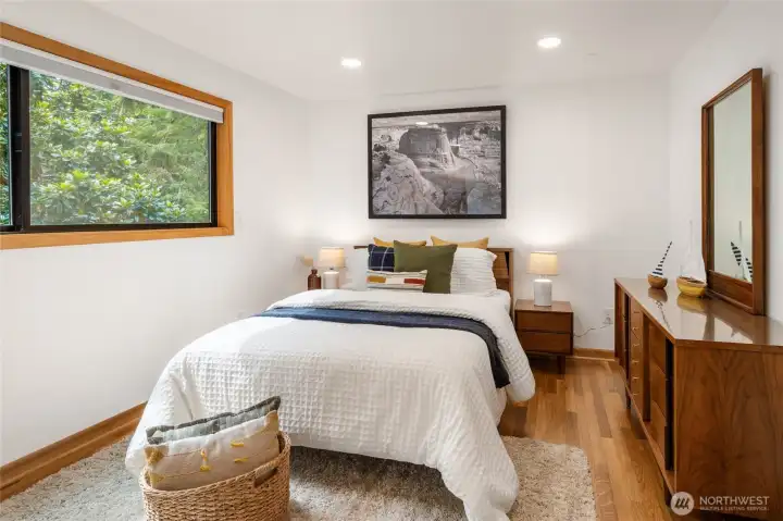 Second lower level bedroom. This layout is great to give guests or teenagers their own separate, private space!