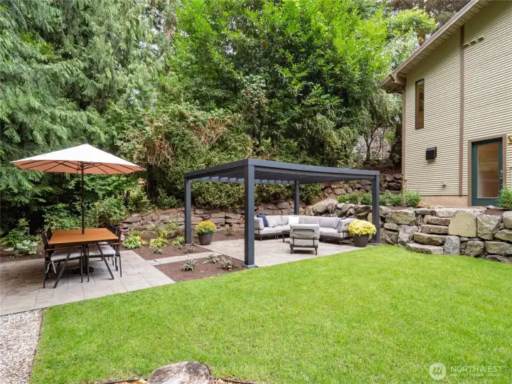 Multiple spaces for outdoor dining, entertaining and relaxation are yours to enjoy.