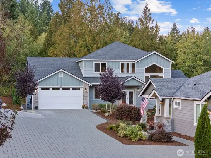 Tucked away in this well maintained neigborhood, yet located next to a green belt that adds to the beauty.