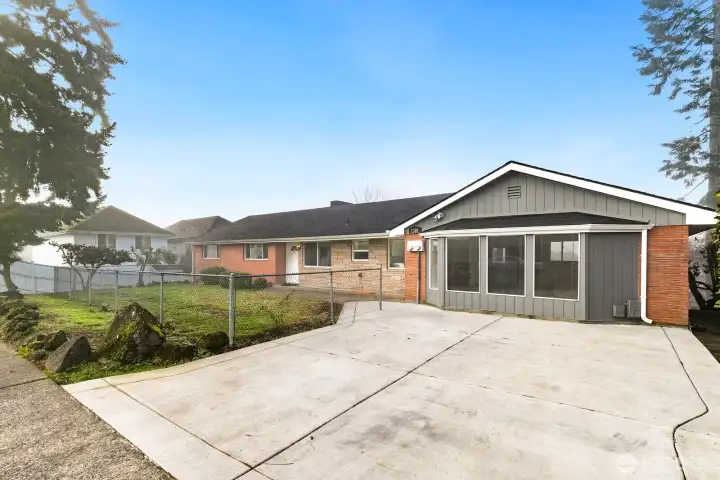 Upper unit parking pad offers plenty of parking.