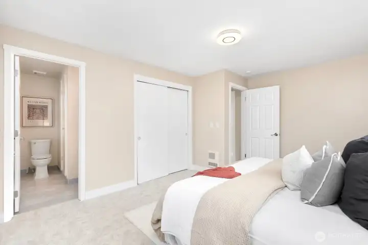 Another view of primary, looking back to closets and ensuite.