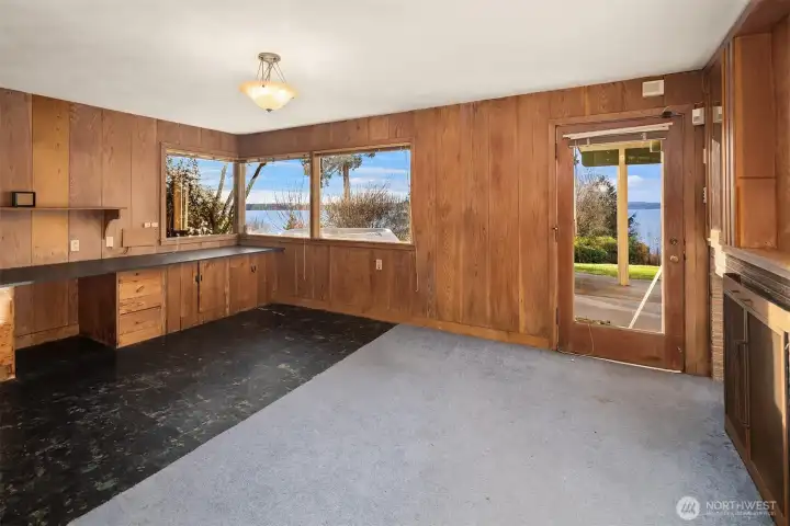Lower level bonus room with fireplace! Another perfect home office with a view.