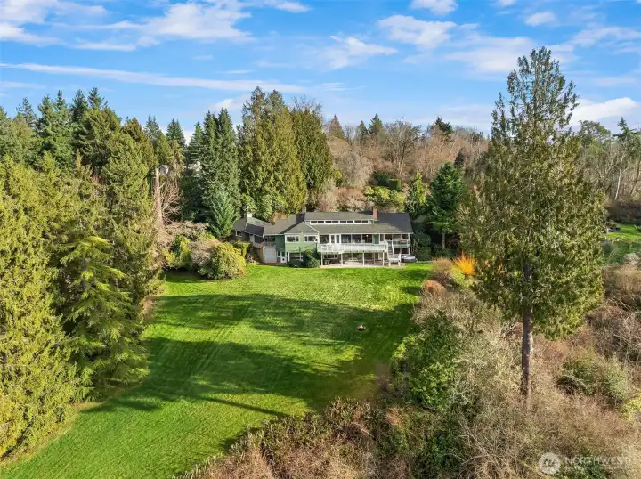 Situated on over 3 acres of lush greenery with endless views of the sound and mountains.