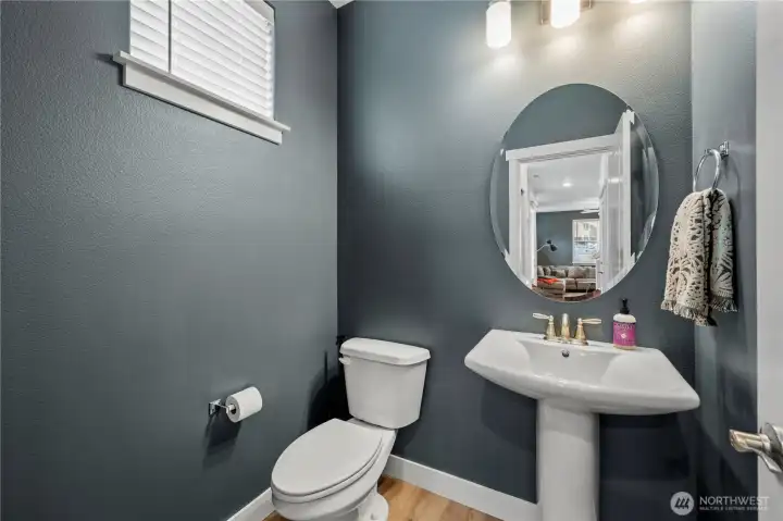 Convenient main-level powder room for guests.