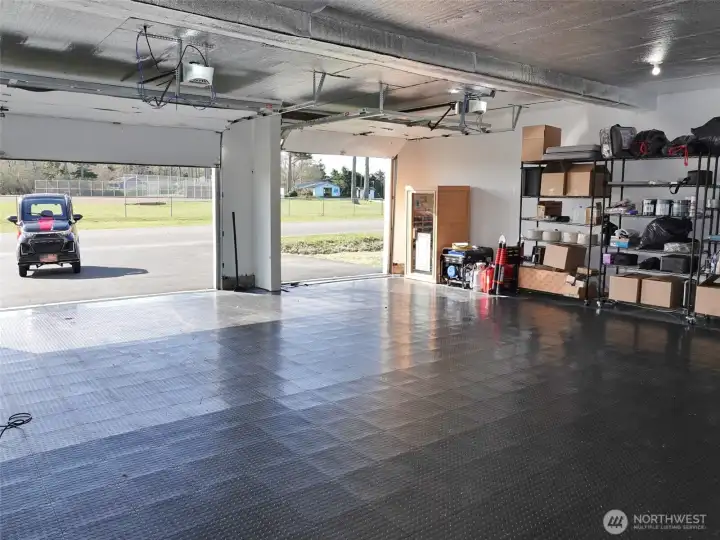 Huge Garage with an asphalt driveway.