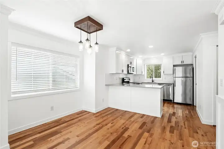 Unlike many other townhouses, this one has a reasonably sized dedicated dining area that allows you to host several guests without compromising living room space.