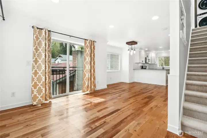 Large enough for a sofa, armchairs, coffee table, AND a six person dining table.