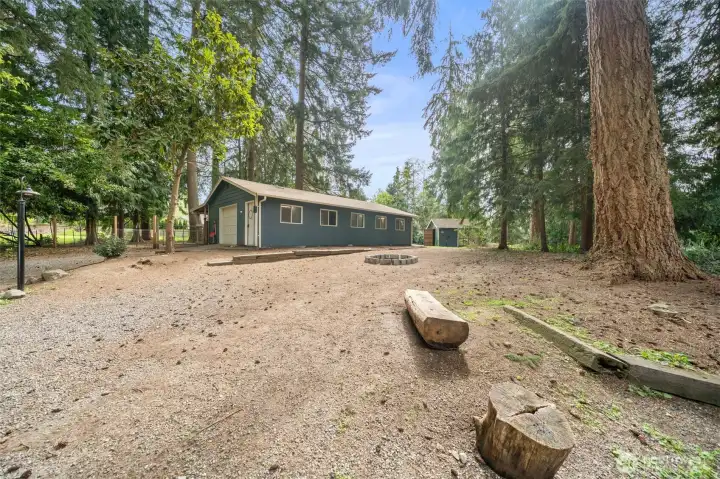 Detached garage and chicken coop.