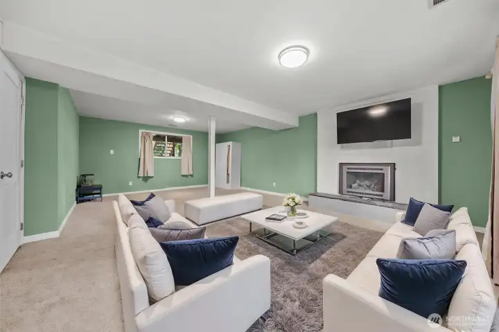 Lower level living room virtually staged