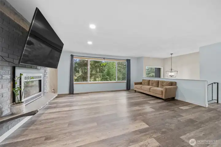 Living room with large picture window .