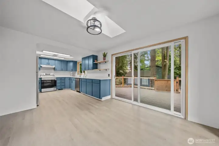 Kitchen with quartz countertops and eating space