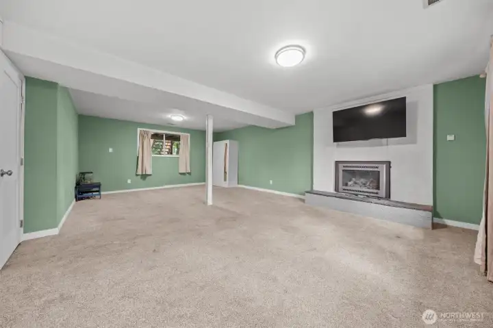 Downstairs, large bonus room/family room.