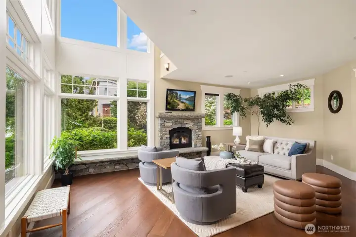 Light bathes the interior spaces from 2-story lakeside windows
