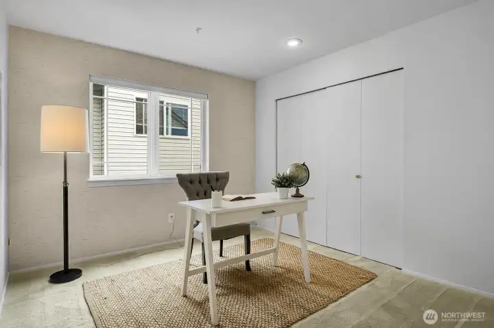 3rd bedroom currently staged as an office 3rd bedroom currently staged as an office