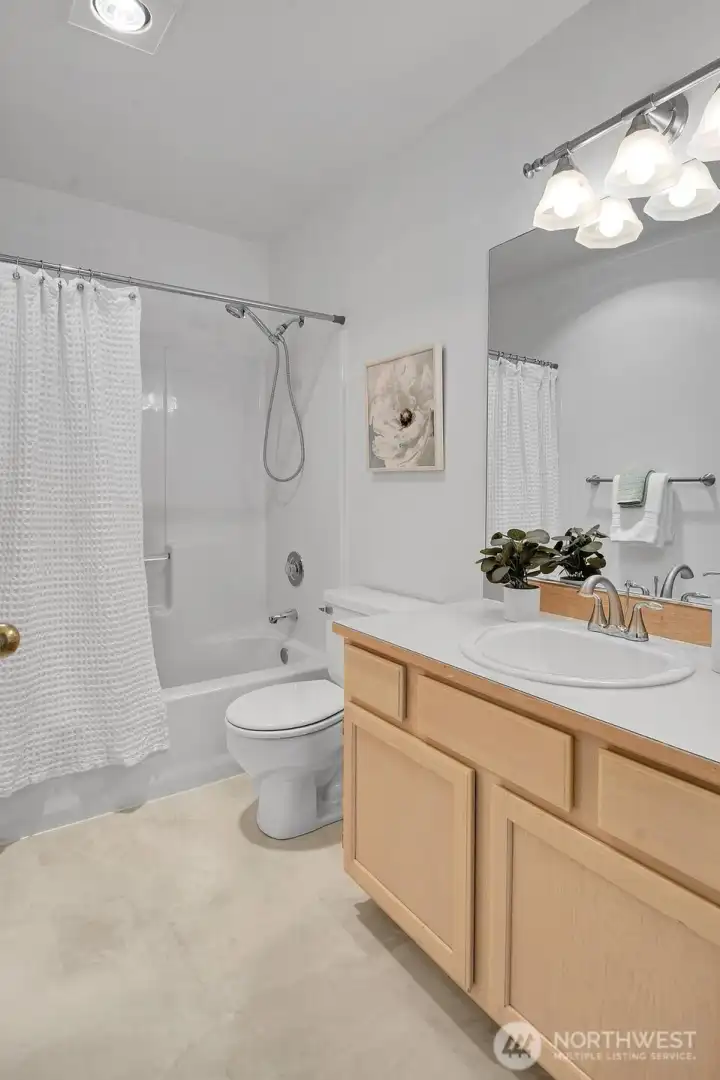 Secondary full bathroom, conveniently located by the secondary bedrooms Secondary full bathroom, conveniently located by the secondary bedrooms