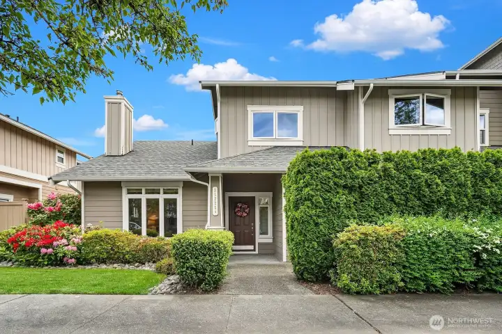 This home boasts a new roof, gutters, exterior paint and meticulous landscaping. All the heavy lifting has been done for you!