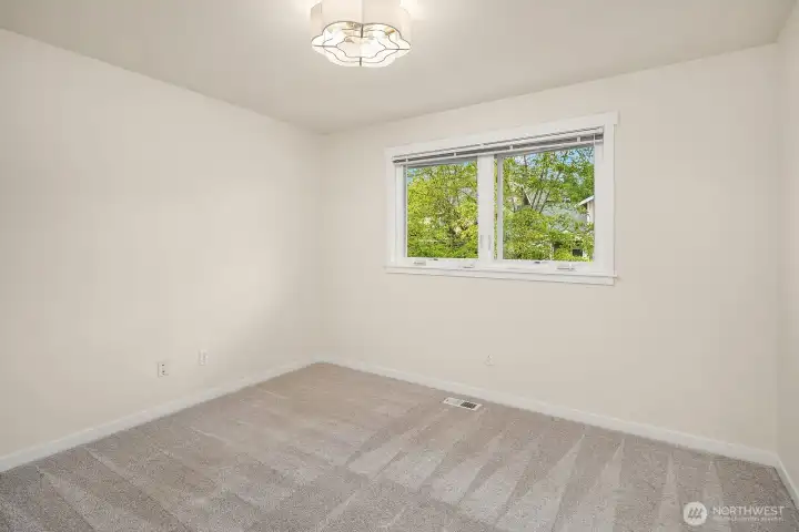 Second guest bedroom upstairs also with a new hidden ceiling fan