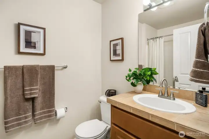 upstairs bathroom with bathtub and shower