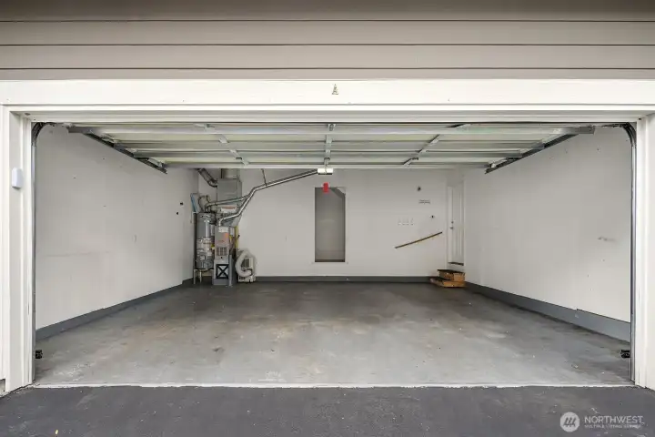 A Rare FULL 2 car garage and extra storage space!