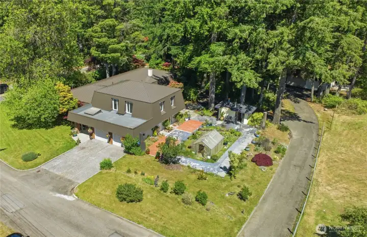 Perfect view of this fabulous residence.  Extensive grounds with gardens, greenhouse, sauna and amazing areas to relax and enjoy this space.