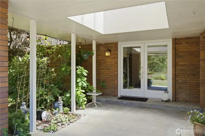 The front entry welcomes you to this unique home with endless possibilities.