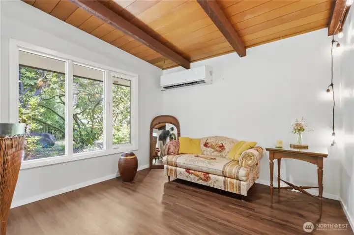 Additional dining and conversation space offers flexibility for everyday living and entertaining.