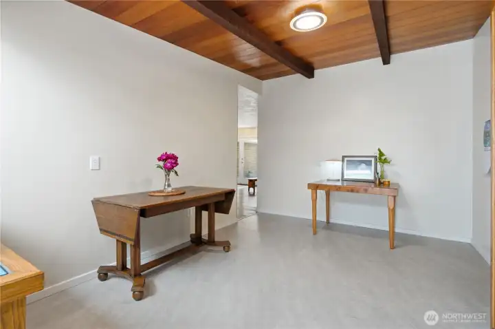 Wonderful extension of the kitchen space.  Inviting bonus area designed for meals, coffee chats, or memorable gatherings.