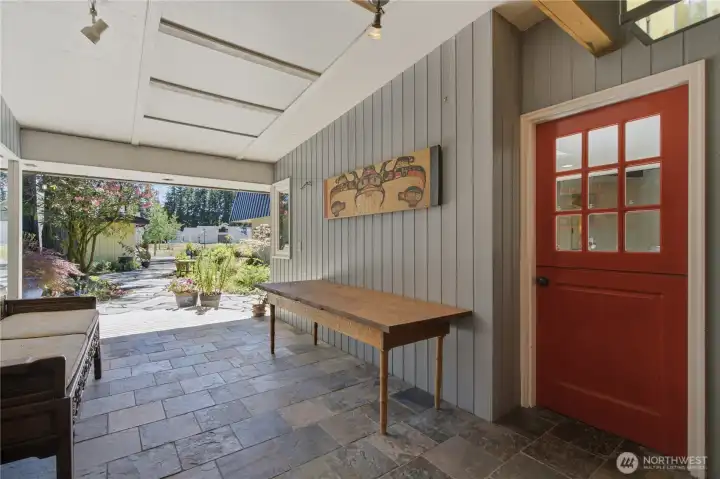 Very attractive covered breezeway that joins to the residences.