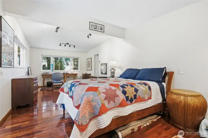 Spacious bedroom with office space.  There is a exit to private deck and rear yard .