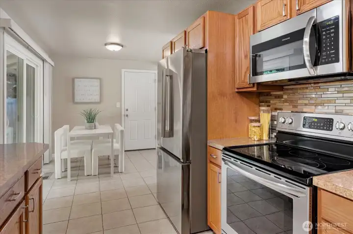 Lovely tiled floors, full stainless appliance package.