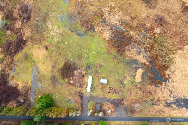 Ariel view of building site, power, water & septic tanks
