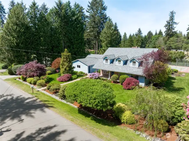 Nestled in a tranquil park-like setting this well-maintained 3600 sq. ft. home on over a half acre of lavish grounds and full-sized sport court. Don't miss this incredible opportunity to own a piece of paradise!